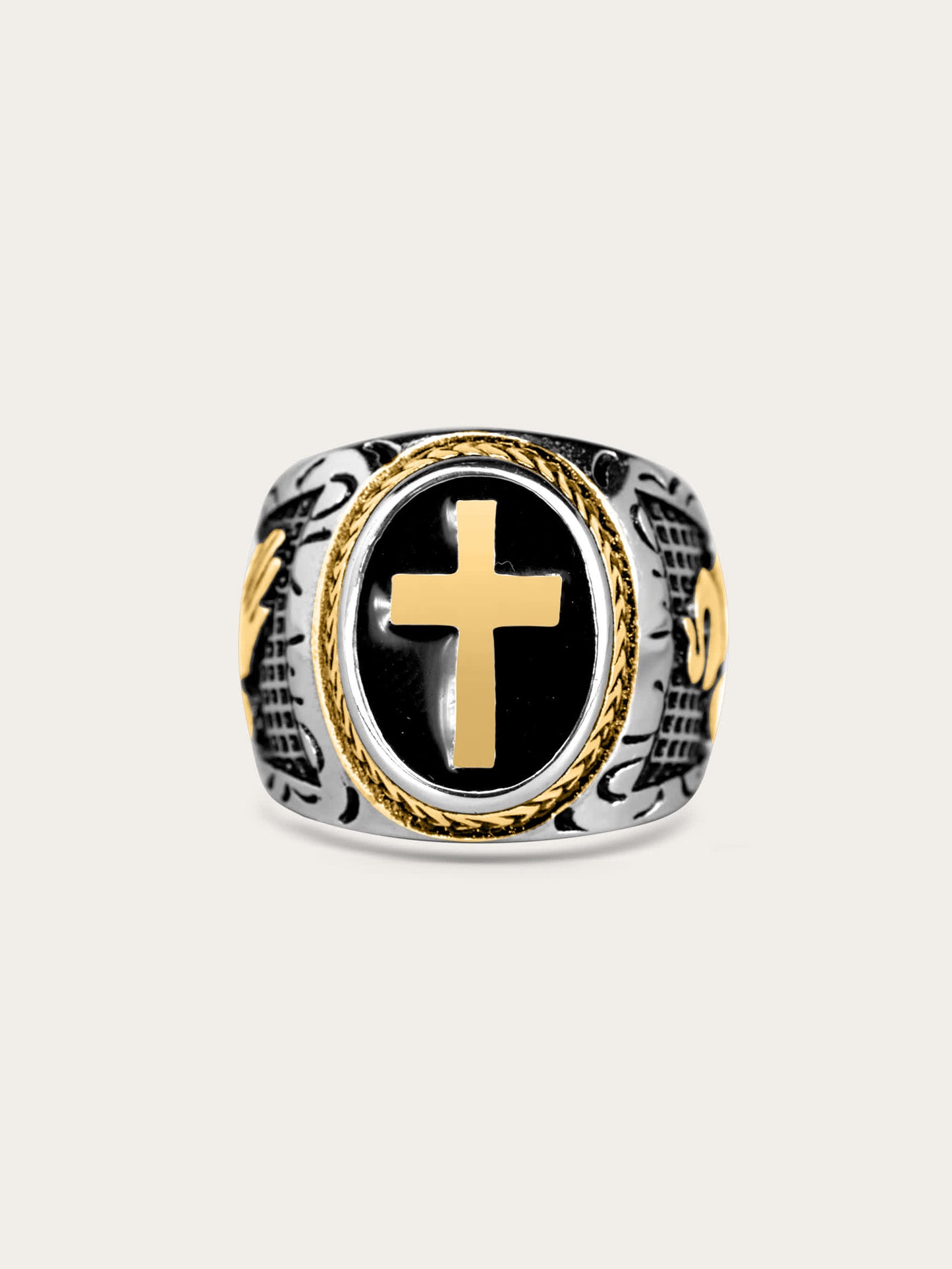 Front-facing view of the Lionheart Sacred Emblem Ring with gold cross and black enamel center on stainless steel