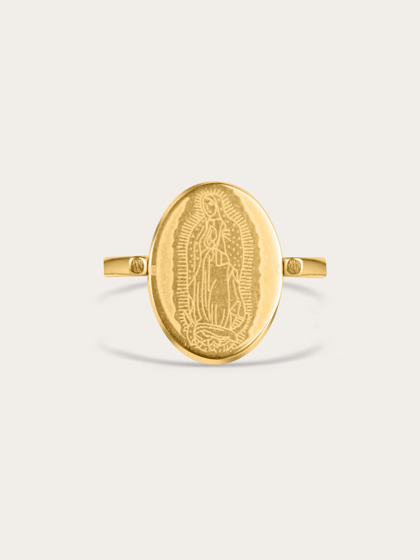 Front-facing view of the Our Lady of Guadalupe ring with polished gold finish and fine engraving