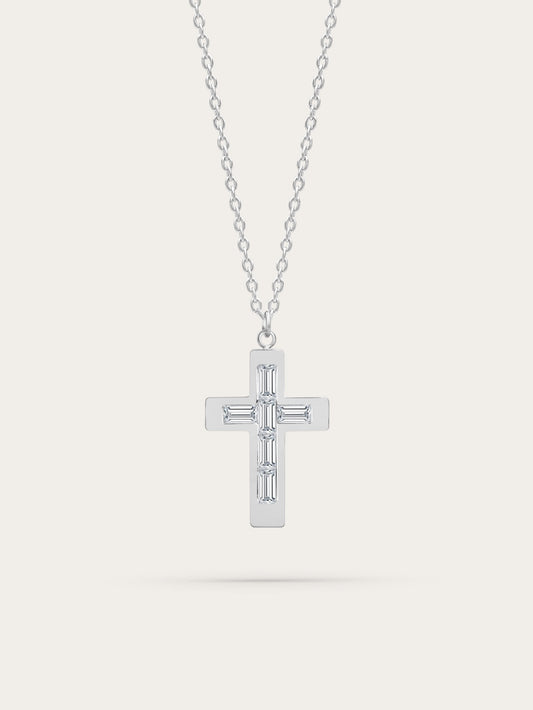 Silver stainless steel cross necklace with baguette-cut zircons on light background