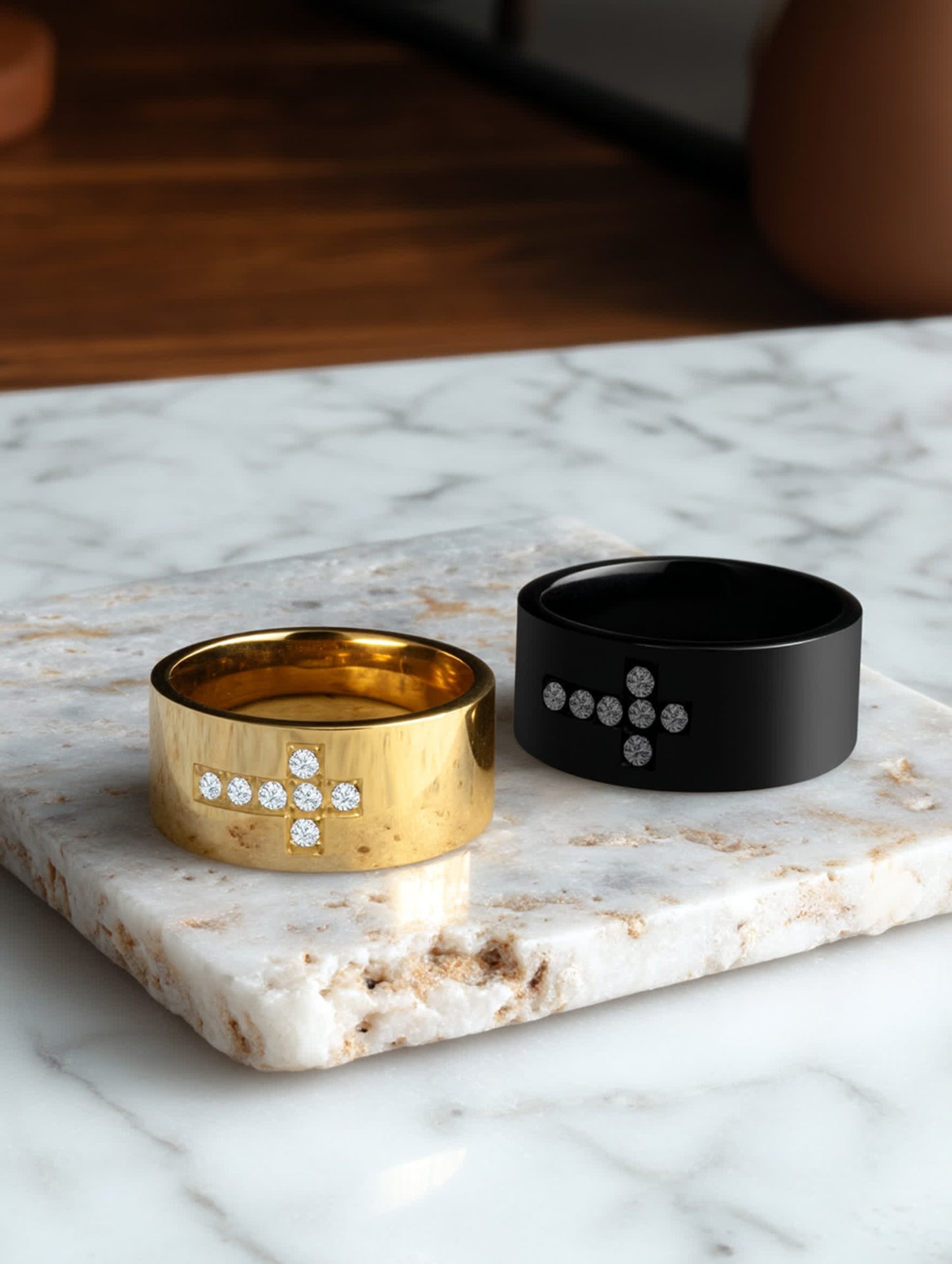 Lifestyle Flat Lay – Marble Surface
Matching gold and black cross rings with crystal accents placed on white marble slab, elegant product flat lay
