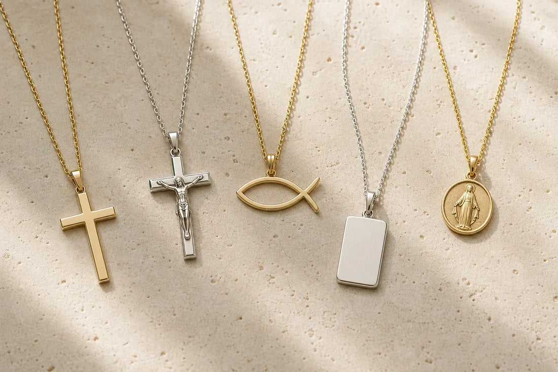 Assortment of cross, crucifix, fish, and devotional religious necklaces on ivory stone