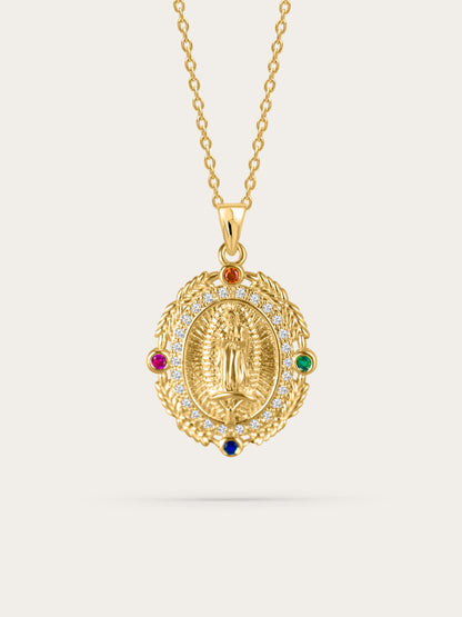 Front-facing studio photo of a gold Virgin Mary necklace with multicolored zircon stones on a neutral background
