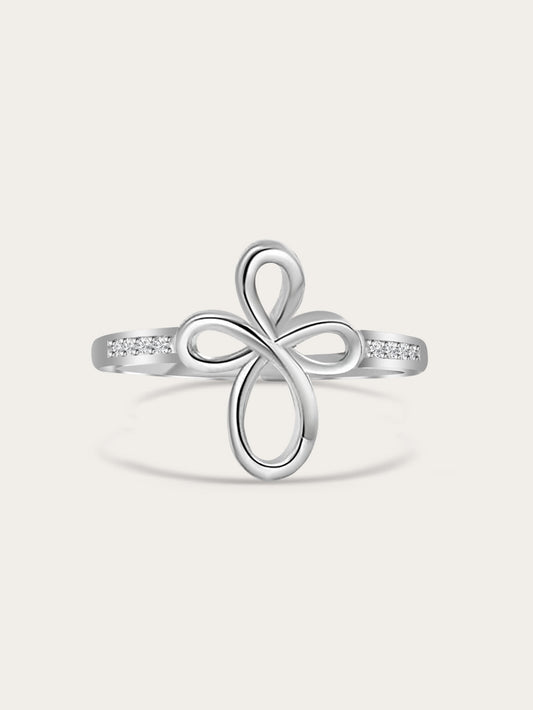Front-facing studio shot of Covenant Bloom Silver Cross Ring showing heart-shaped petal cross design with white zircons on a neutral background