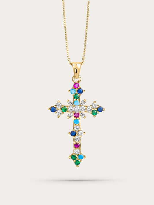 Front-facing studio photo of the colorful crystal cross pendant on light beige background, featuring multicolor zircon stones and gold chain