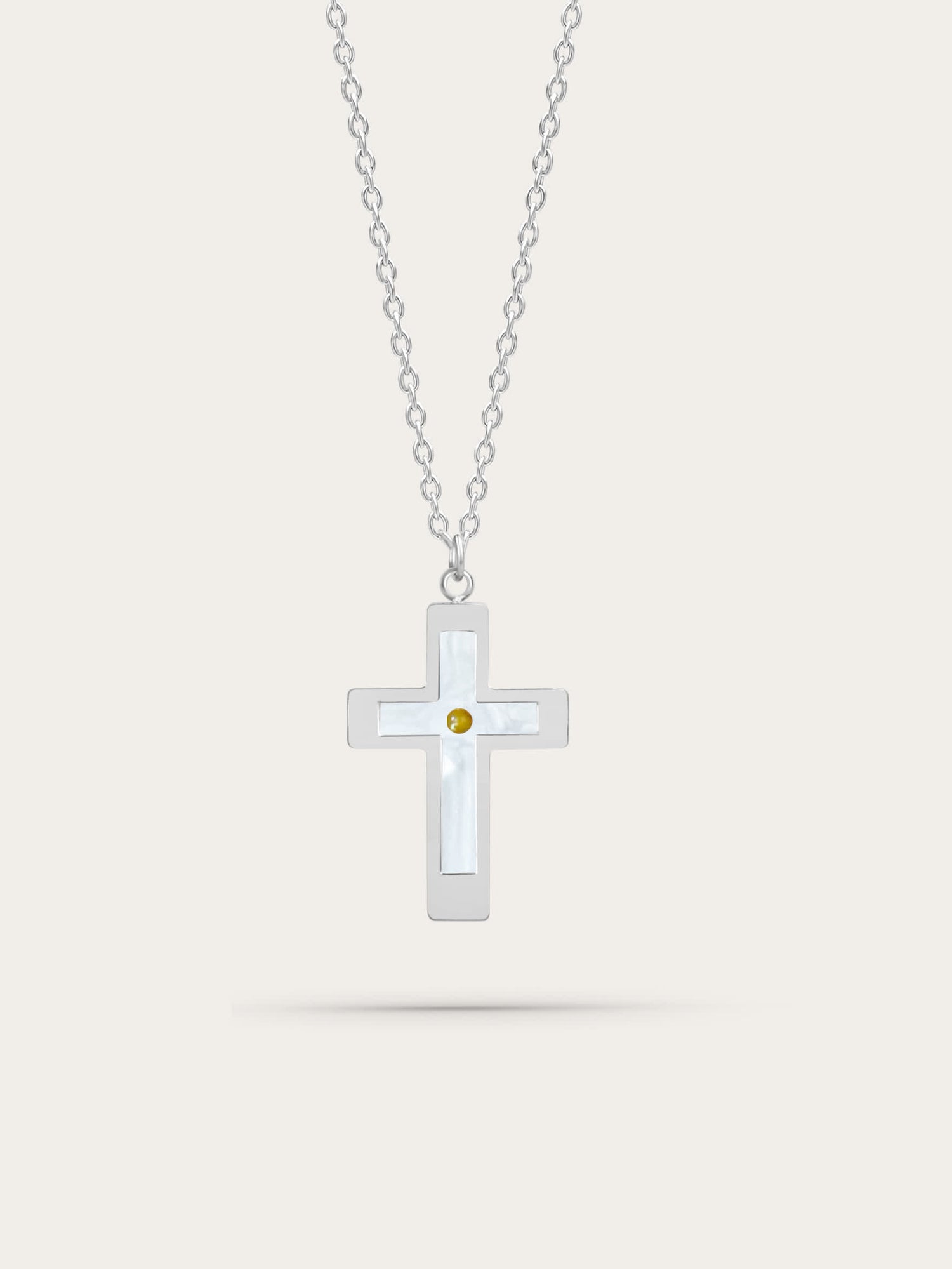 Front-facing product image on light background
Stainless steel mustard seed cross necklace with real mustard seed center, displayed on light beige background