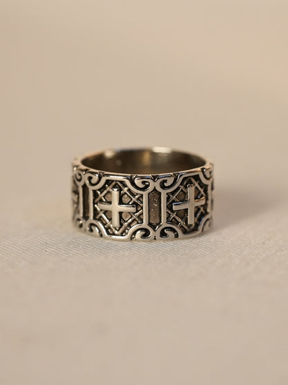 Testament Armor Ring photographed on linen fabric with antique silver detail