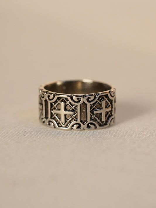Testament Armor Ring photographed on linen fabric with antique silver detail